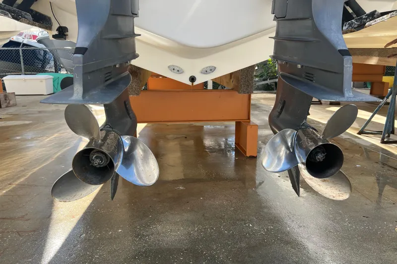  Yacht Photos Pics Twin propellers of a 2006 Intrepid 350 Open CC boat on a stand.