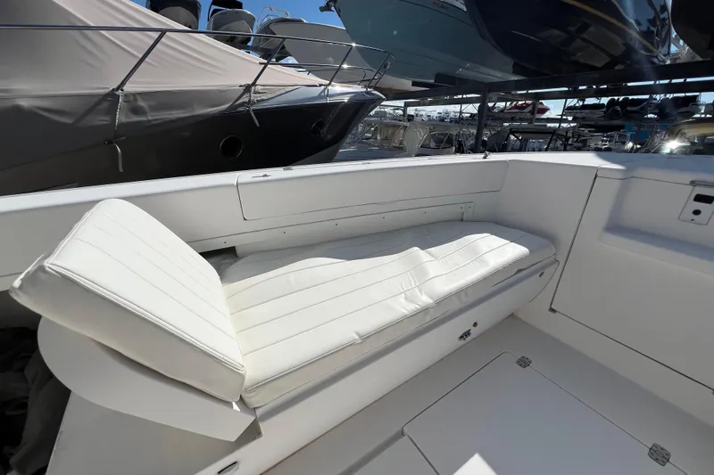  Yacht Photos Pics 2006 Intrepid 350 Open CC boat interior with white cushioned seating.