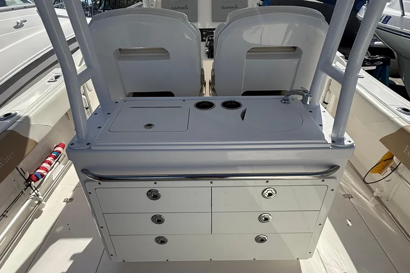  Yacht Photos Pics 2016 Edgewater 280CC boat interior with storage drawers and sink station.