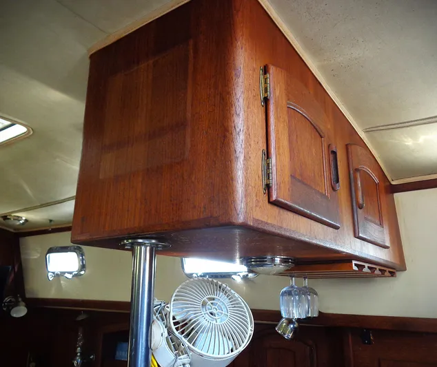 Remedy Yacht Photos Pics Wooden interior cabinetry of a 1995 Pacific Seacraft 37 sailboat.
