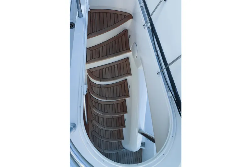  Yacht Photos Pics Curved wooden staircase on a 2009 Sunseeker Manhattan 70 yacht,&nbsp;for sale in Mexico by Servicios Nauticos and Gaston Troche
