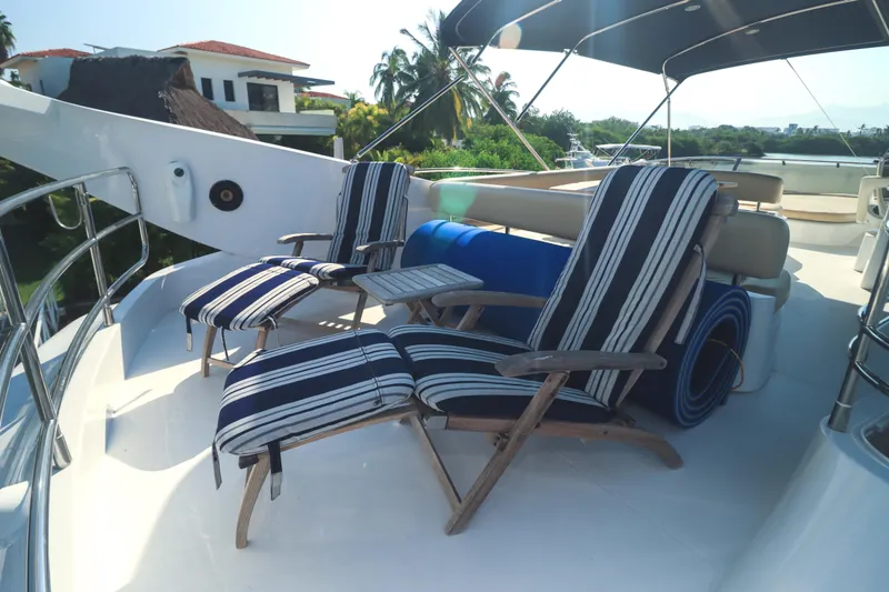  Yacht Photos Pics Sunseeker Manhattan 70 yacht deck with striped lounge chairs, 2009 model,&nbsp;for sale in Mexico by Servicios Nauticos and Gaston Troche