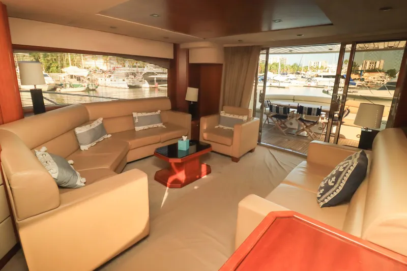  Yacht Photos Pics Luxurious interior of 2009 Sunseeker Manhattan 70 yacht with elegant seating and marina view,&nbsp;for sale in Mexico by Servicios Nauticos and Gaston Troche