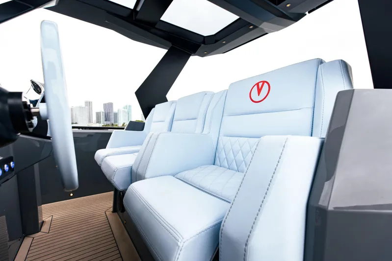  Yacht Photos Pics 2022 Vanquish Yachts VQ40 interior with luxurious white seating and modern design.