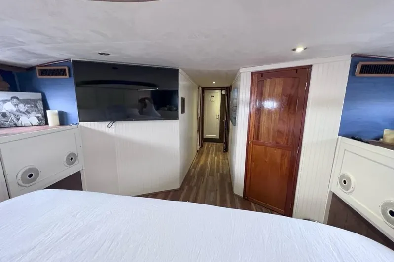 Nother Venture Yacht Photos Pics Interior of 1989 Hatteras 78 CPMY yacht with modern decor and wood accents.