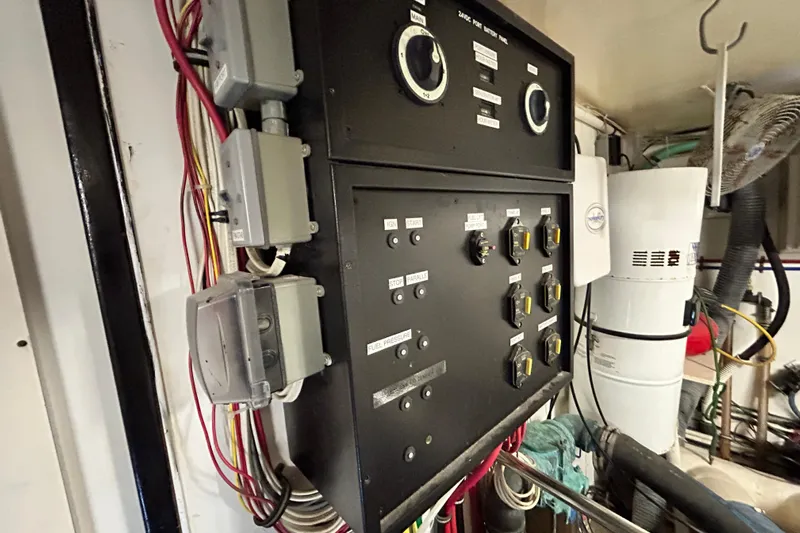 Nother Venture Yacht Photos Pics Electrical panel in 1989 Hatteras 78 CPMY yacht engine room.