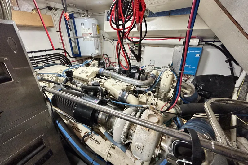 Nother Venture Yacht Photos Pics Engine room of 1989 Hatteras 78 CPMY yacht with Detroit Diesel engine components.