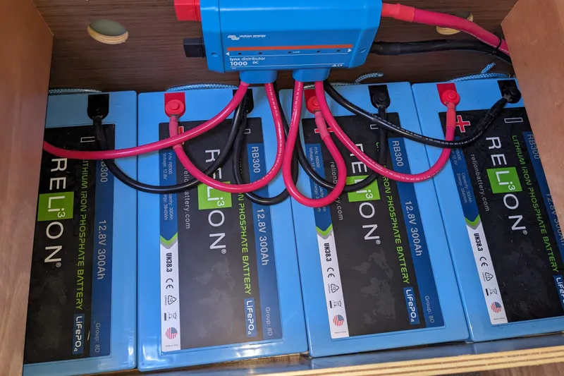 Hopena Yacht Photos Pics Lithium iron phosphate batteries in a Lagoon 42, 2019 model, with wiring connections.