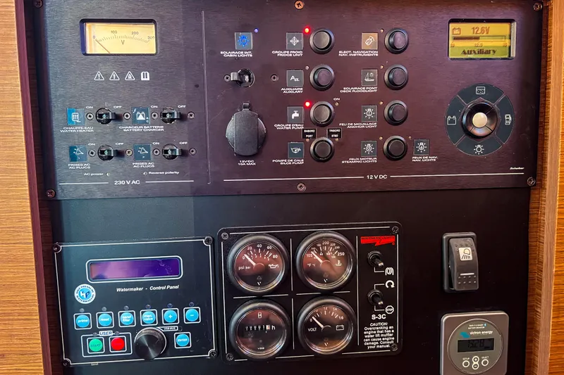 Hopena Yacht Photos Pics Control panel of a 2019 Lagoon 42 yacht with various gauges and switches.