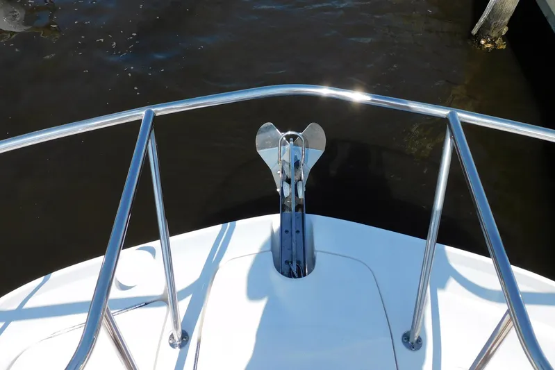 Not Guilty Yacht Photos Pics Bow view of 2018 Sea Ray Sundancer 320 with stainless steel railings and anchor.