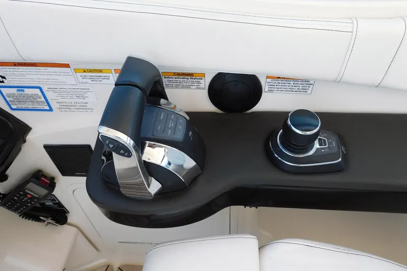 Not Guilty Yacht Photos Pics Control panel of 2018 Sea Ray Sundancer 320 boat with throttle and joystick.