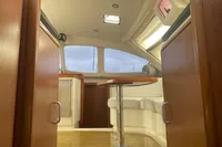 Interior of 2009 Leopard 40 catamaran with wooden finishes and seating area.