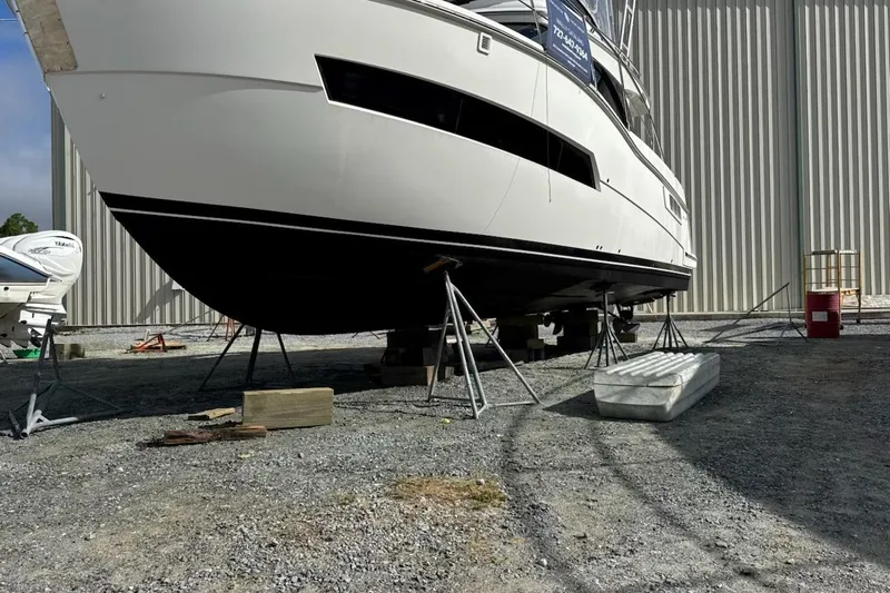 Mjm Grand Yacht Photos Pics 2020 Carver 36 Command Bridge yacht on stands in a boatyard.
