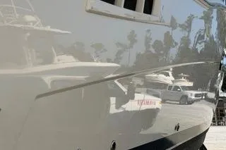 Mjm Grand Yacht Photos Pics 2020 Carver 36 Command Bridge yacht with sleek exterior design in marina setting.