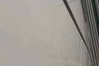 Mjm Grand Yacht Photos Pics Foggy view of a Carver 36 Command Bridge yacht, 2020 model, partially obscured.