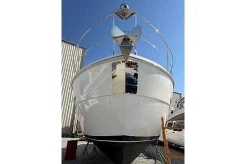 Mjm Grand Yacht Photos Pics 2020 Carver 36 Command Bridge yacht, docked, front view, clear blue sky.