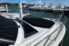  Yacht Photos Pics Boston Whaler 405 Conquest 2022 docked at marina with other boats in background.