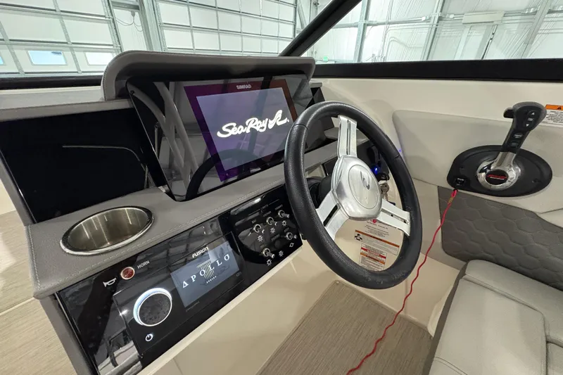  Yacht Photos Pics 2022 Sea Ray SDX 270 Outboard helm with steering wheel, touchscreen, and controls.