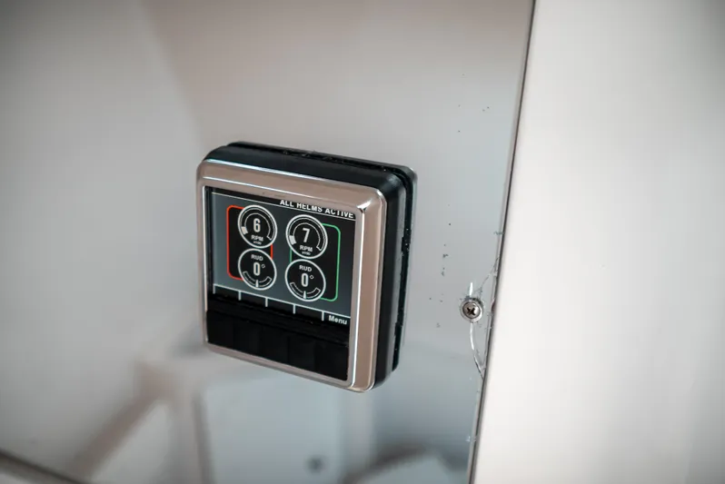  Yacht Photos Pics Control panel on a 2019 Jupiter 34FS boat, featuring digital display and buttons.