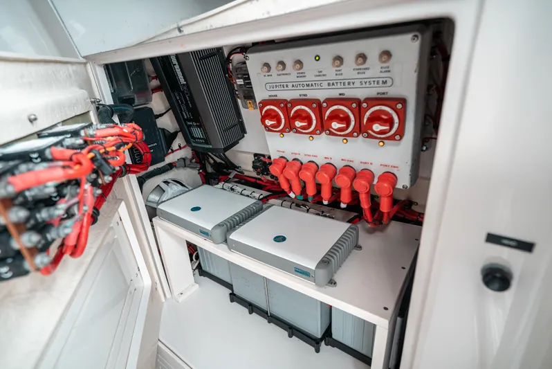  Yacht Photos Pics 2019 Jupiter 34FS boat battery system with red switches and wiring.