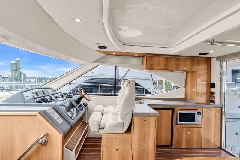 Ayeroller Yacht Photos Pics Interior of a 2014 Riviera 44 Sport Yacht with modern amenities.