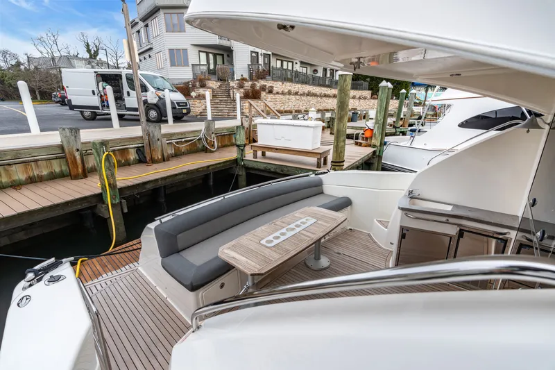 Ayeroller Yacht Photos Pics Riviera 44 Sport Yacht 2014 at dock with seating area.