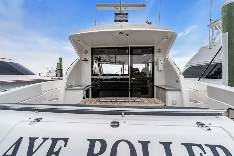 Ayeroller Yacht Photos Pics Riviera 44 Sport Yacht 2014 at dock, rear view.