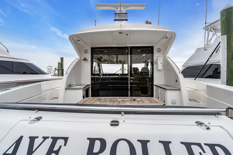 Ayeroller Yacht Photos Pics Riviera 44 Sport Yacht 2014 at dock, rear view.