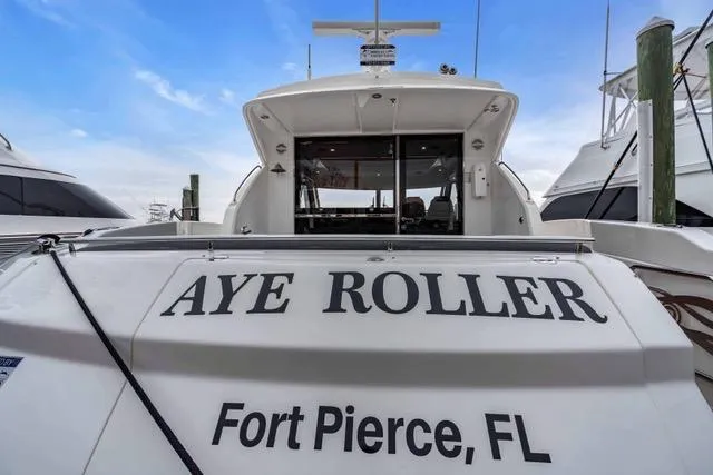 Ayeroller Yacht Photos Pics 2014 Riviera 4400 Sport Yacht "Aye Roller" docked in Fort Pierce, FL.