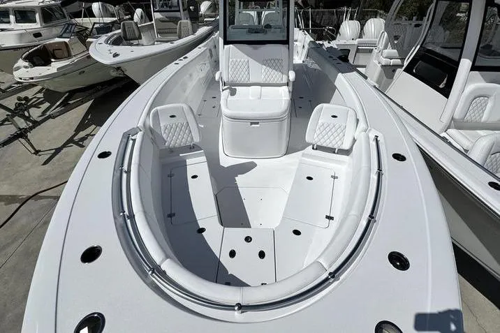  Yacht Photos Pics 2026 Sportsman Heritage 321 Center Console boat with spacious seating and sleek design.