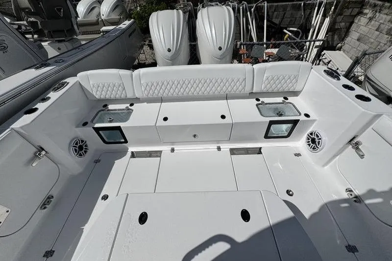  Yacht Photos Pics 2026 Sportsman Heritage 321 Center Console boat interior with seating and storage compartments.