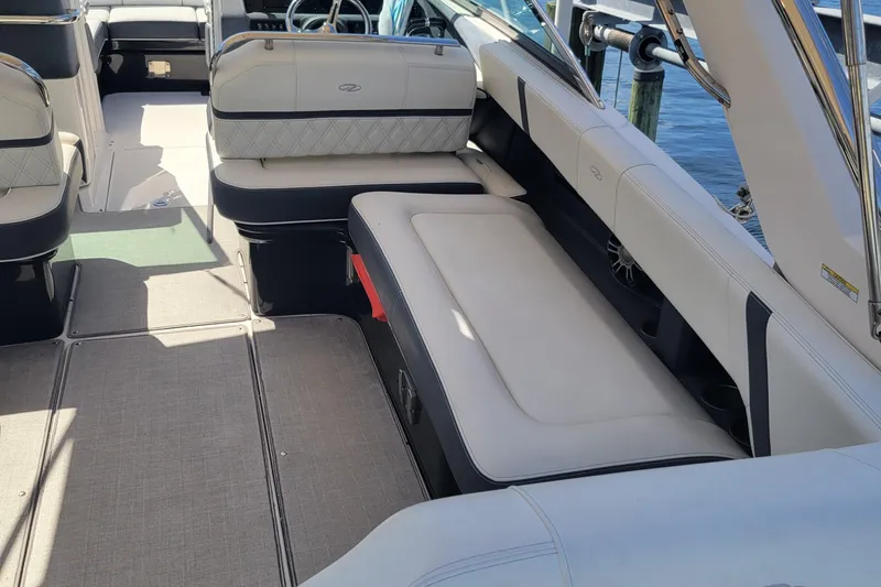  Yacht Photos Pics 2020 Regal 29 OBX boat interior with spacious seating and elegant design.
