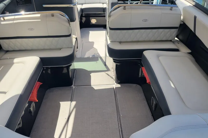  Yacht Photos Pics 2020 Regal 29 OBX boat interior with spacious seating and modern design.