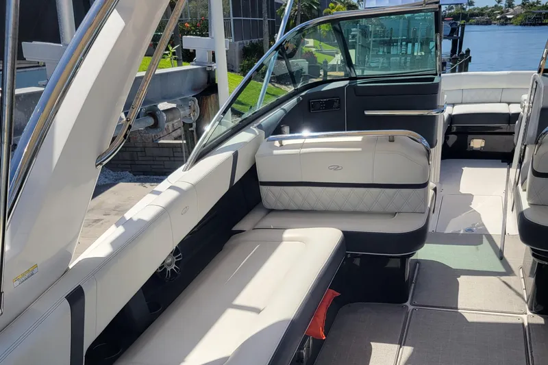  Yacht Photos Pics 2020 Regal 29 OBX boat interior with luxurious seating and modern design.