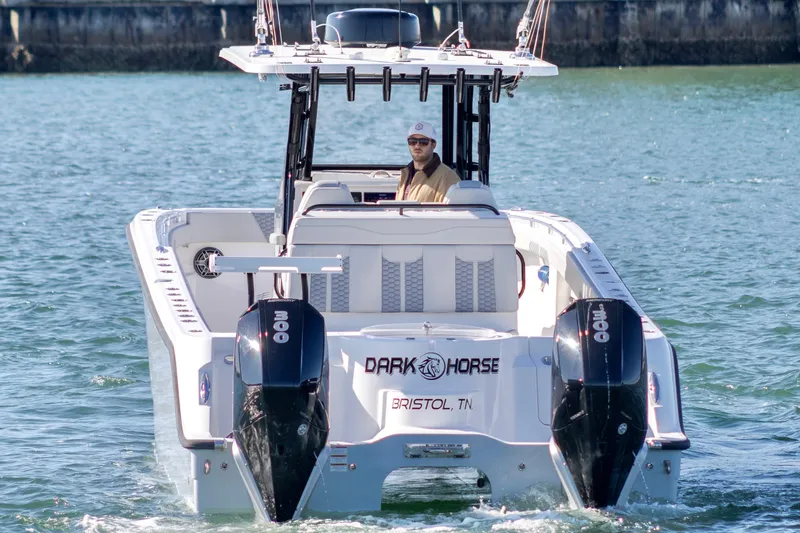  Yacht Photos Pics 2022 Invincible 33 Catamaran on water, featuring twin engines and sleek design.