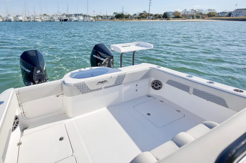  Yacht Photos Pics 2022 Invincible 33 Catamaran on water, featuring spacious deck and dual engines.