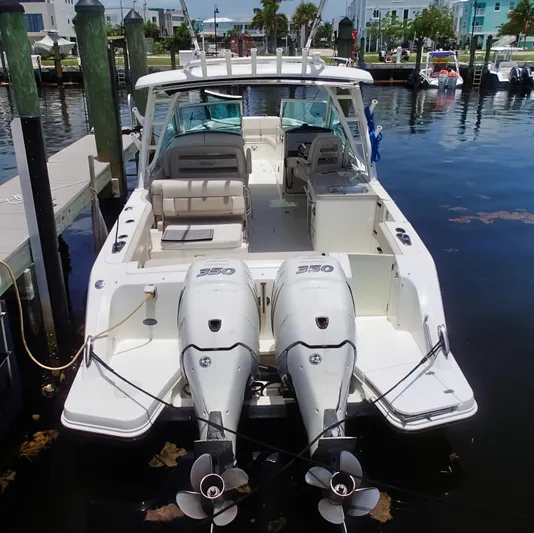 Born Free Yacht Photos Pics 2017 Boston Whaler 320 Vantage boat docked with dual engines.