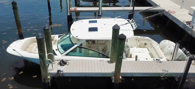 Born Free Yacht Photos Pics 2017 Boston Whaler 320 Vantage docked at marina, aerial view.