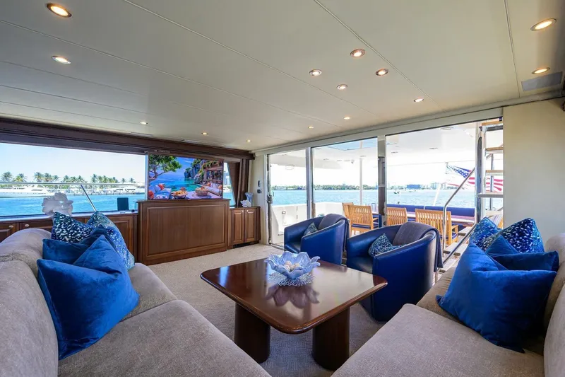 Jule Yacht Photos Pics Luxurious interior of 2005 Pacific Mariner 85 yacht with elegant seating and ocean view.