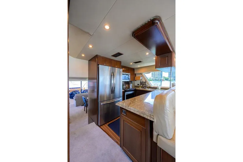 Jule Yacht Photos Pics Luxurious kitchen interior of 2005 Pacific Mariner 85 yacht with modern appliances.