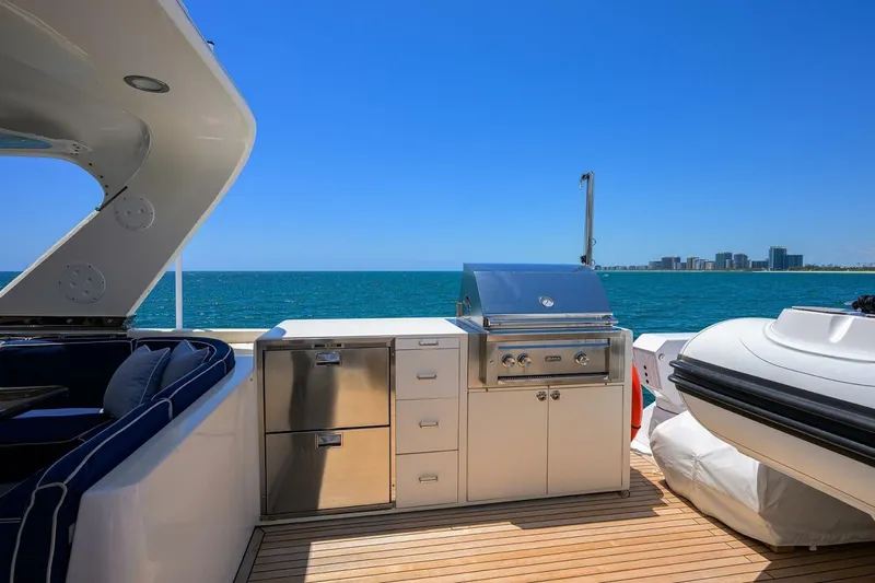 Jule Yacht Photos Pics Luxury yacht deck with grill, ocean view; 2005 Pacific Mariner 85 model.