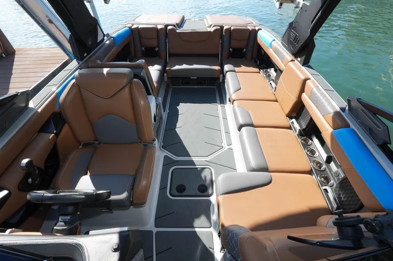  Yacht Photos Pics Luxurious interior of 2020 Malibu M240 boat with spacious seating and modern design.