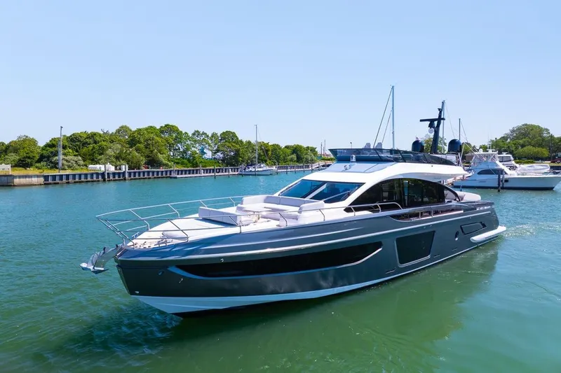 Second Chances Yacht Photos Pics 2024 Azimut S7 luxury yacht cruising in a serene marina setting.