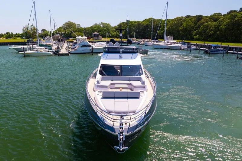 Second Chances Yacht Photos Pics 2024 Azimut S7 yacht docked in a scenic marina with surrounding boats.