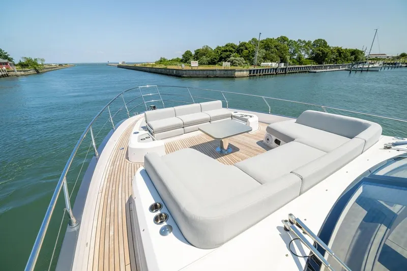 Second Chances Yacht Photos Pics Luxurious 2024 Azimut S7 yacht with spacious deck and elegant seating area.