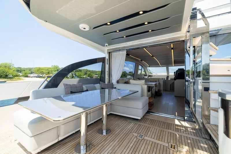 Second Chances Yacht Photos Pics Luxurious 2024 Azimut S7 yacht interior with elegant seating and modern design.