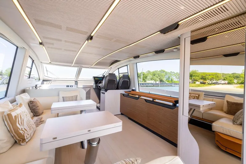 Second Chances Yacht Photos Pics Luxurious interior of 2024 Azimut S7 yacht with modern seating and elegant design.