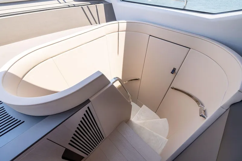Second Chances Yacht Photos Pics Luxurious interior staircase of 2024 Azimut S7 yacht, featuring elegant design and modern finishes.