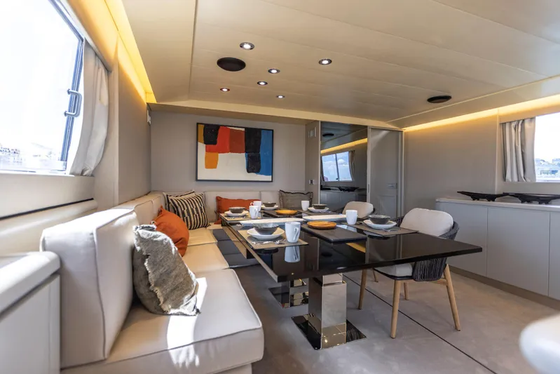  Yacht Photos Pics Luxurious dining area on 1987 Versilcraft FALCON 82 yacht with modern decor and elegant table setting.