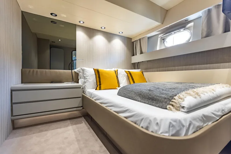  Yacht Photos Pics Luxurious bedroom interior of 1987 Versilcraft FALCON 82 yacht with modern decor.